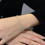 Goudkleurige tennisarmband met markiesslijpsel