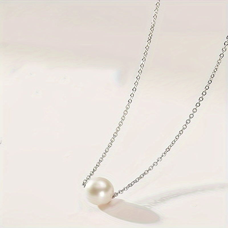 Witgoudkleurige ketting met witte imitatieparel als hanger
