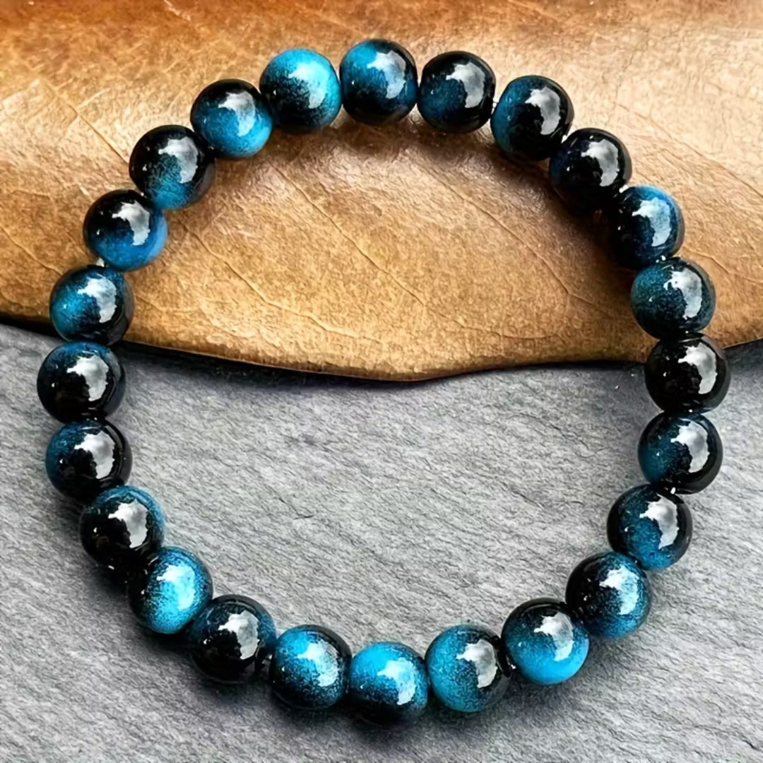 Kralenarmband met stenen in granaatlook