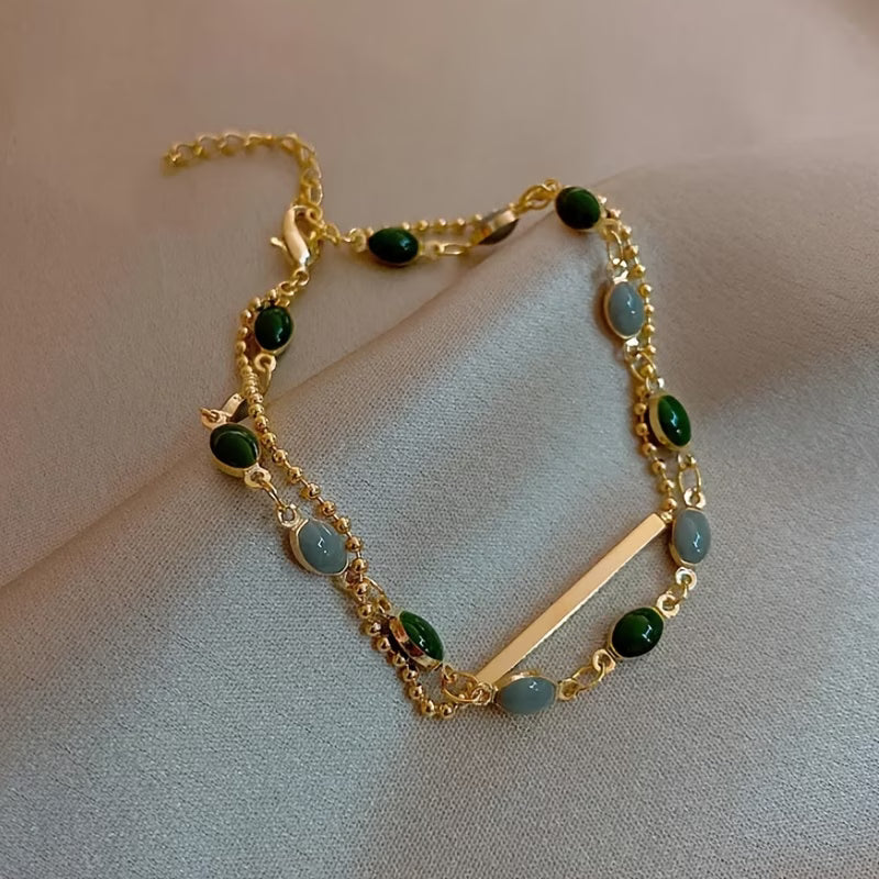 Gold-Tone Chain Bracelet with Green Square Stones