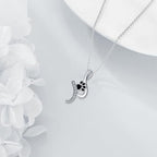 Ketting met zwarte pootafdrukhanger