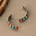 Zilverkleurige turquoise oorringen in southwesternstijl