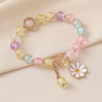 Crackle-glazen kralenarmband met madeliefjeshanger