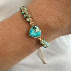 Gevlochten turquoise armband met hartsteen