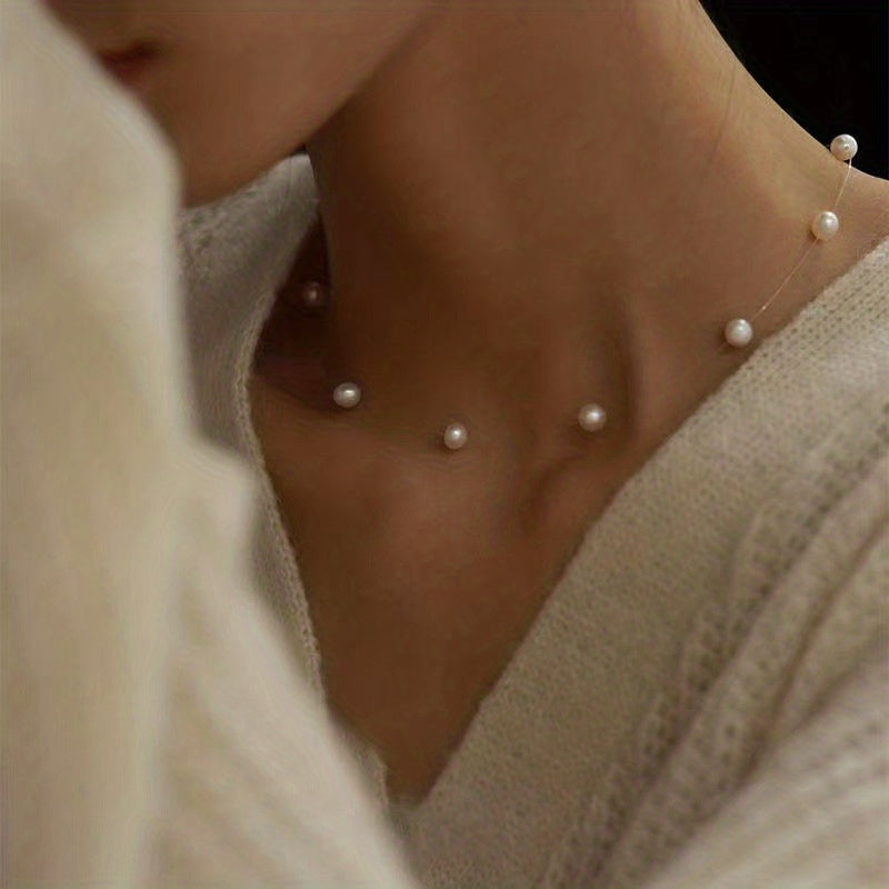 Minimalistische witte parelketting