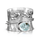Ambachtelijke zilverkleurige spinnerring met blad in aquamarijnlook