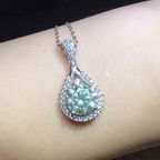 Green Teardrop Halo Pendant in White Gold Tone