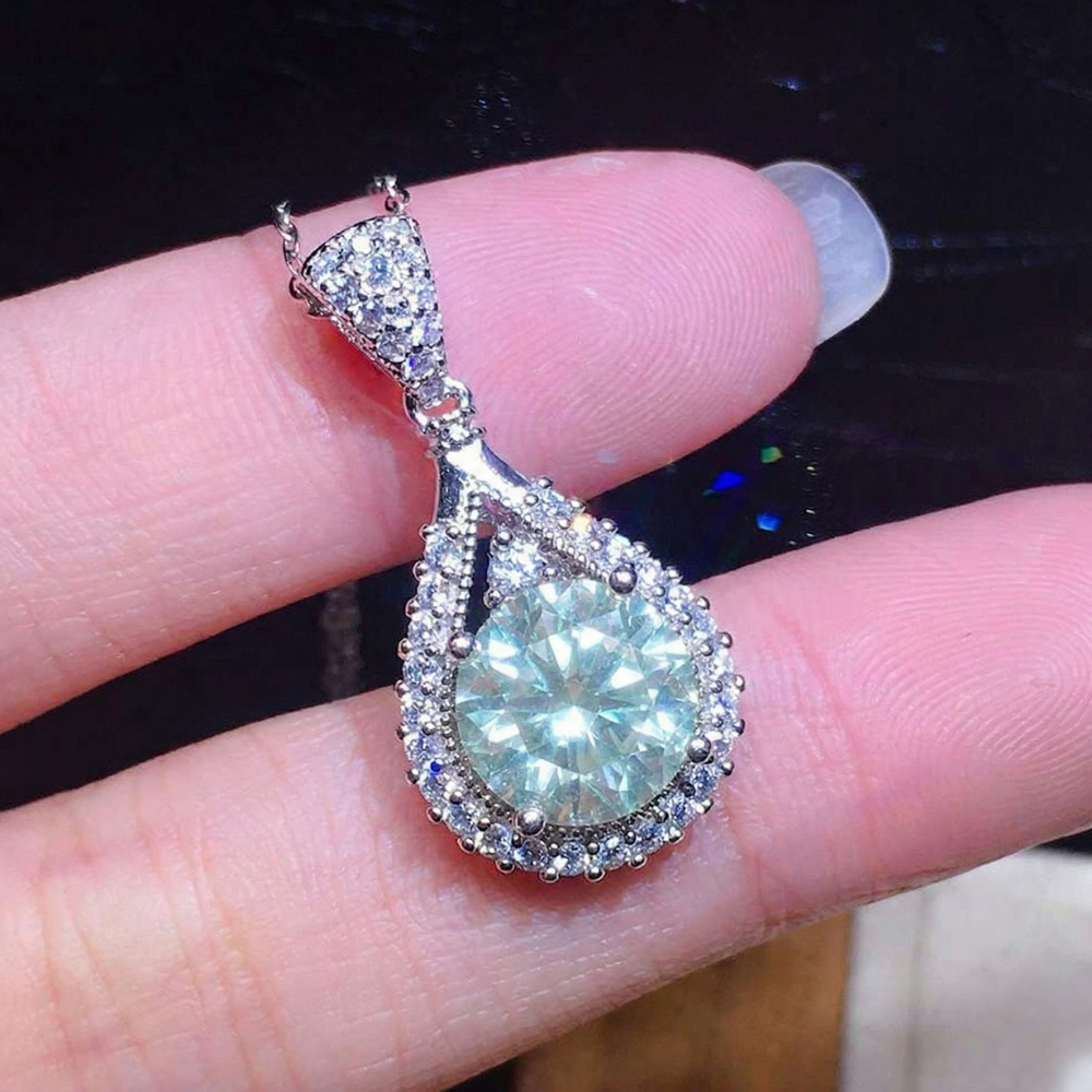 Green Teardrop Halo Pendant in White Gold Tone