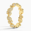 Goudkleurige eternityring met bladrank en kristallen