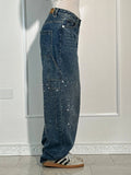 Oversized jeans met ballonpijp en glinsterende juweeltjes