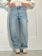 Oversized jeans met ballonpijp en glinsterende juweeltjes