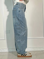 Oversized jeans met ballonpijp en glinsterende juweeltjes