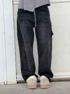 Oversized jeans met ballonpijp en glinsterende juweeltjes