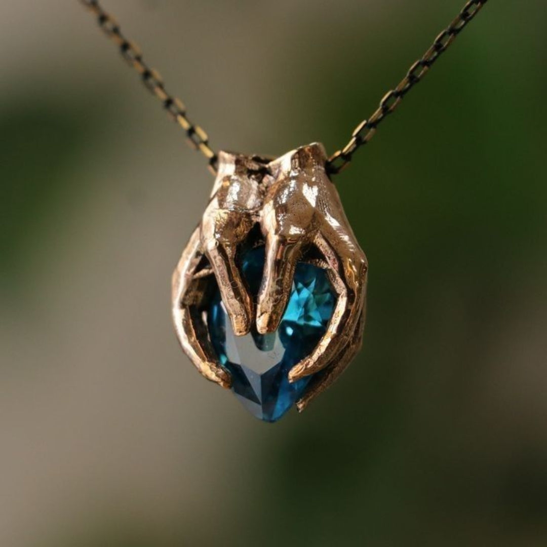 Blue Stone Embrace Pendant Necklace