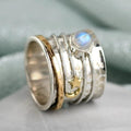 Spinnerring met ster, maan en maansteen