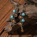 Boho oorbellen met zirkonia en opaallook in zilverkleur