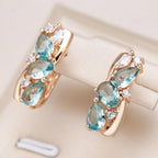 Blue Zirconia Earrings in Gold Tone