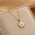 Goudkleurige ketting met zonnebloemhanger en kristal