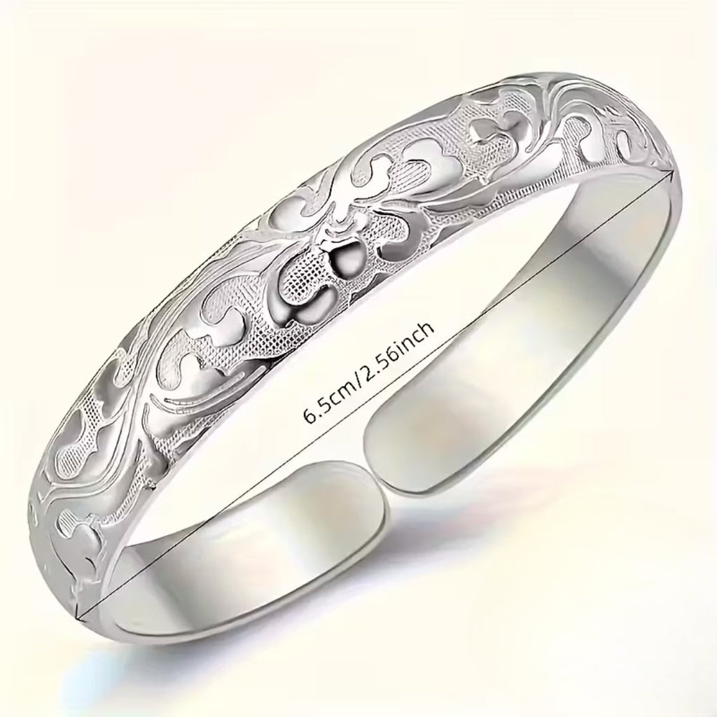 Retro zilverkleurige bloemenarmband