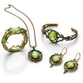 Sieradenbundel met groene opaallook en ring