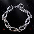 Zilverkleurige schakelarmband met clipschakels