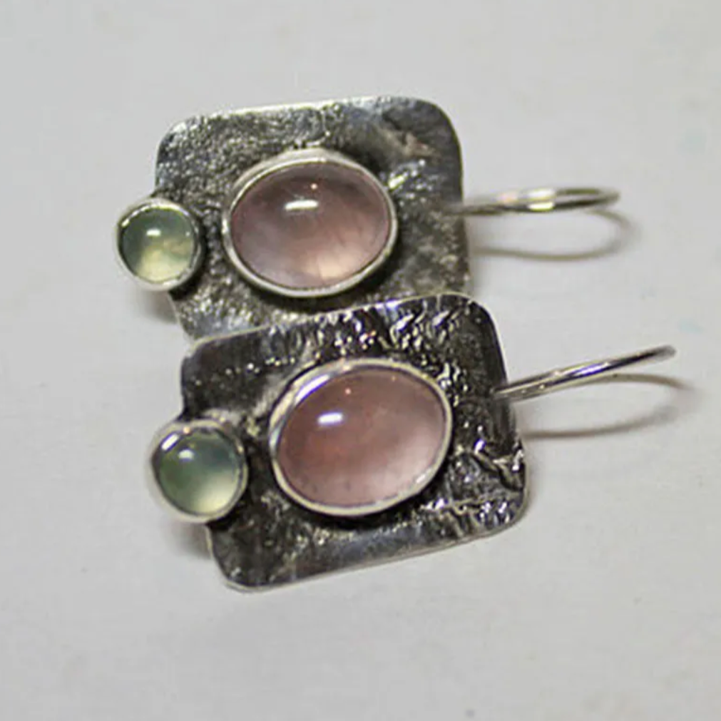 Boucles d'oreilles serties de cristal rose style vintage