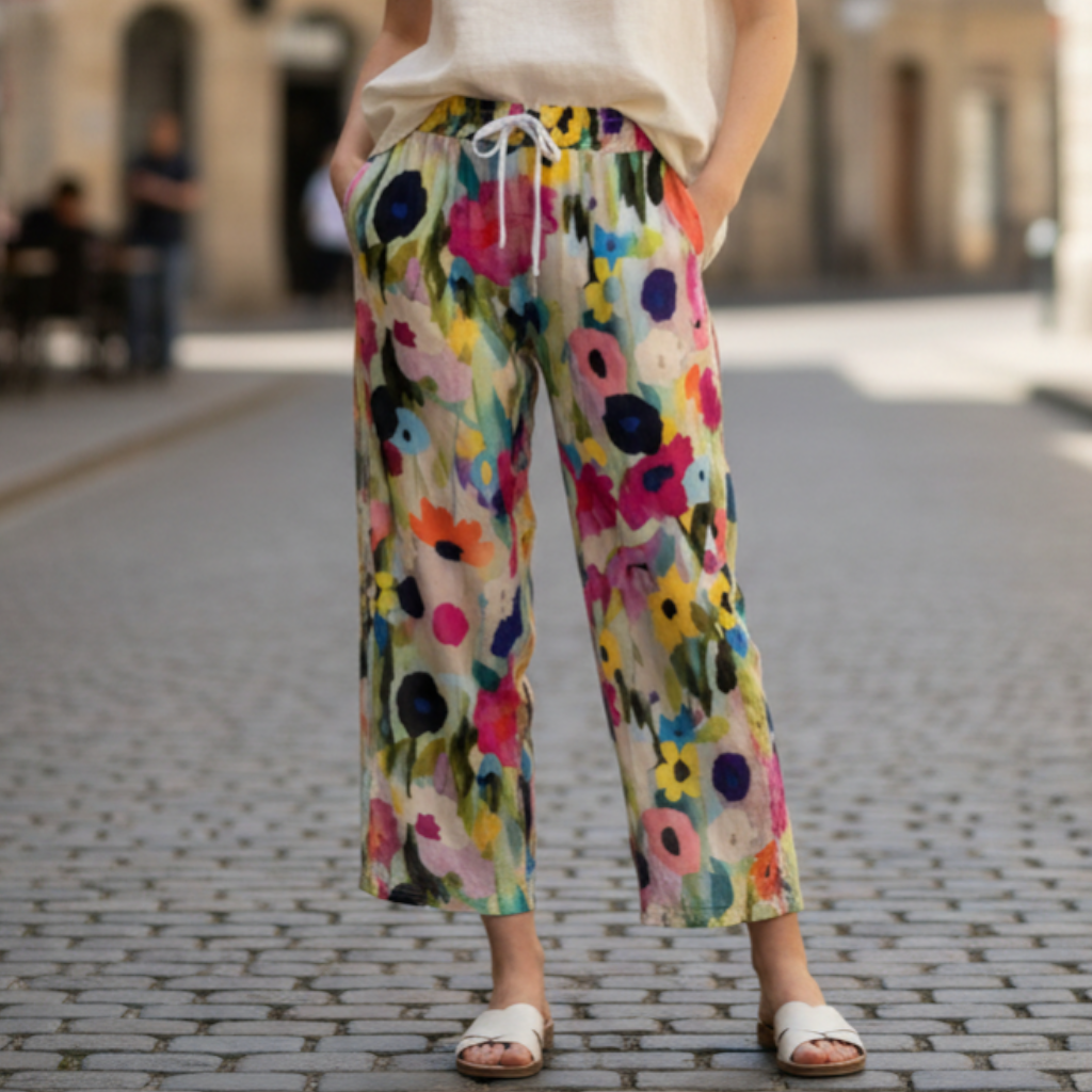 Broek met bloemenprint, medium taille en zakken opzij