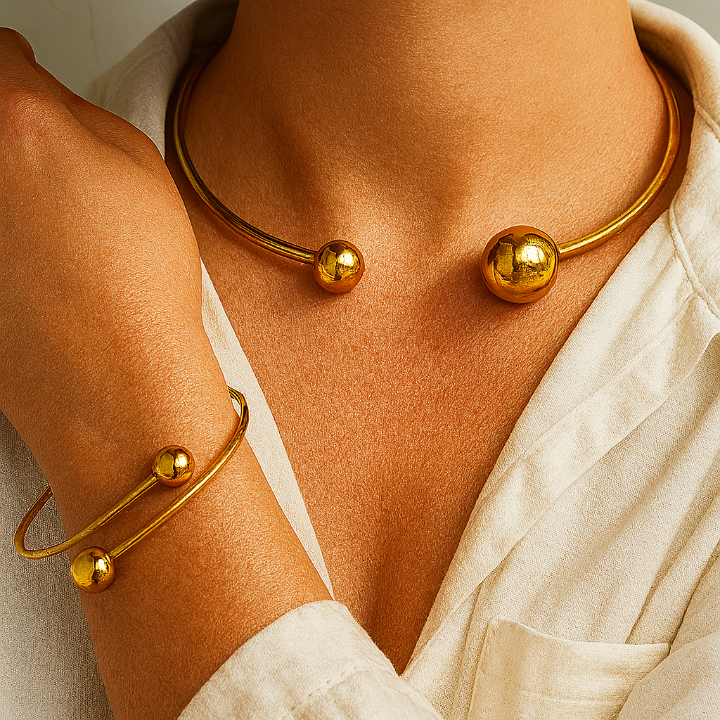 Minimalistische set van collier en open armband in twee metaaltinten