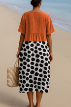 Colourblock jurk met stippenrok en losse zomerse pasvorm