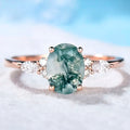 Ronde goudkleurige ring met mosagaat en zirkonia