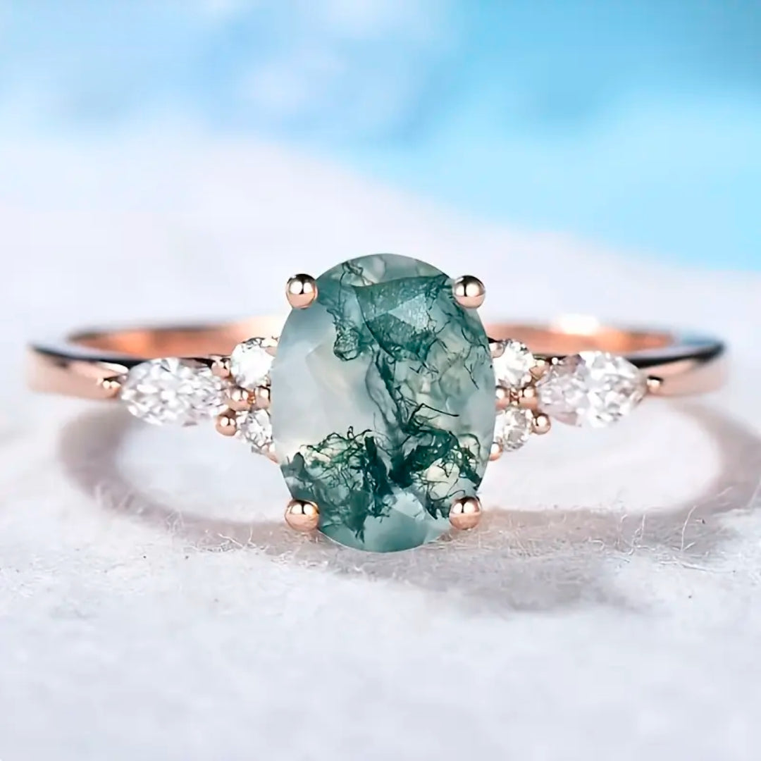 Ronde goudkleurige ring met mosagaat en zirkonia