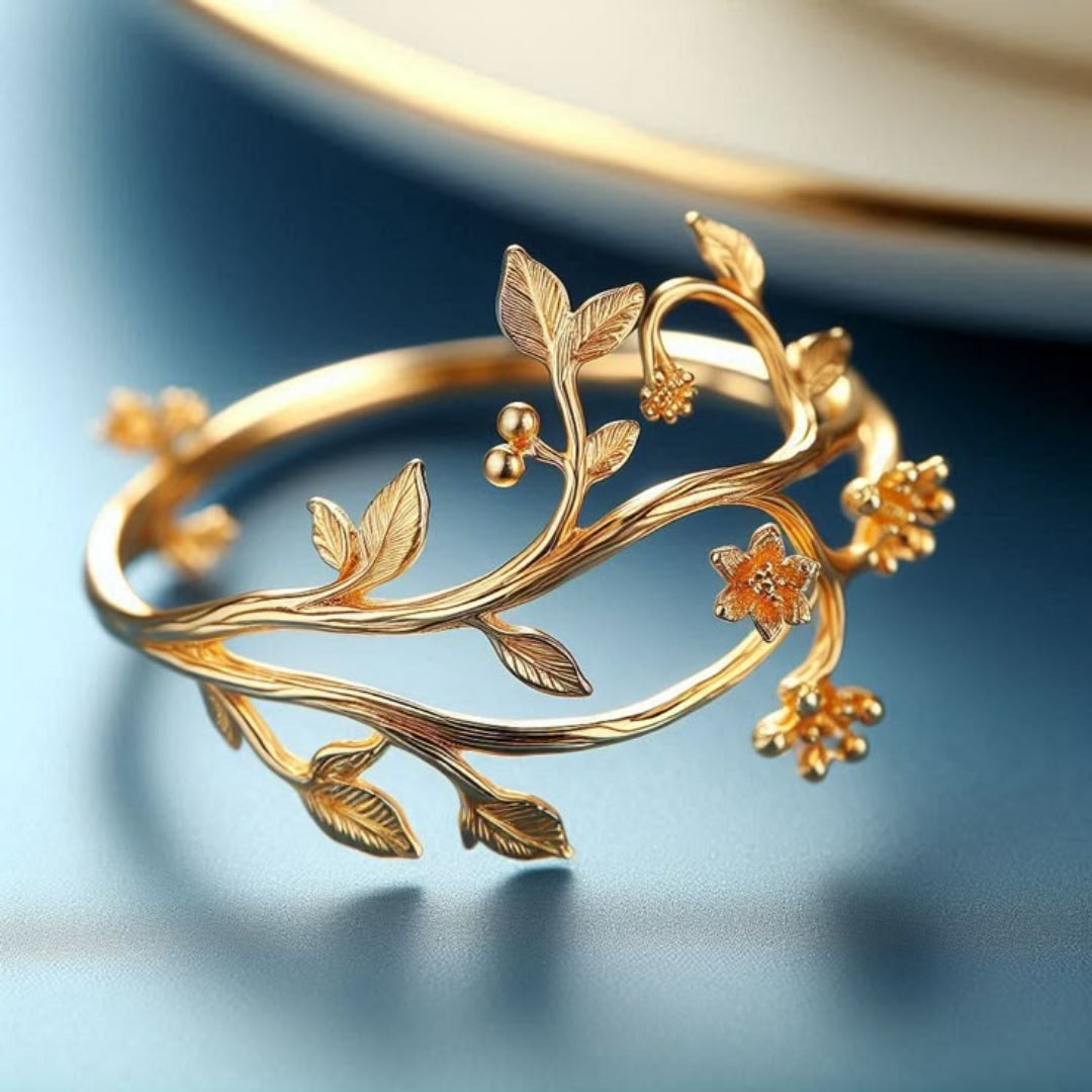 Goudkleurige ring met bloementak