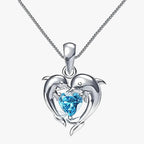 Ketting met twee dolfijnen en blauw hart