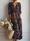 Jurk met bloemenprint en een elegant, vrouwelijk silhouet (2)
