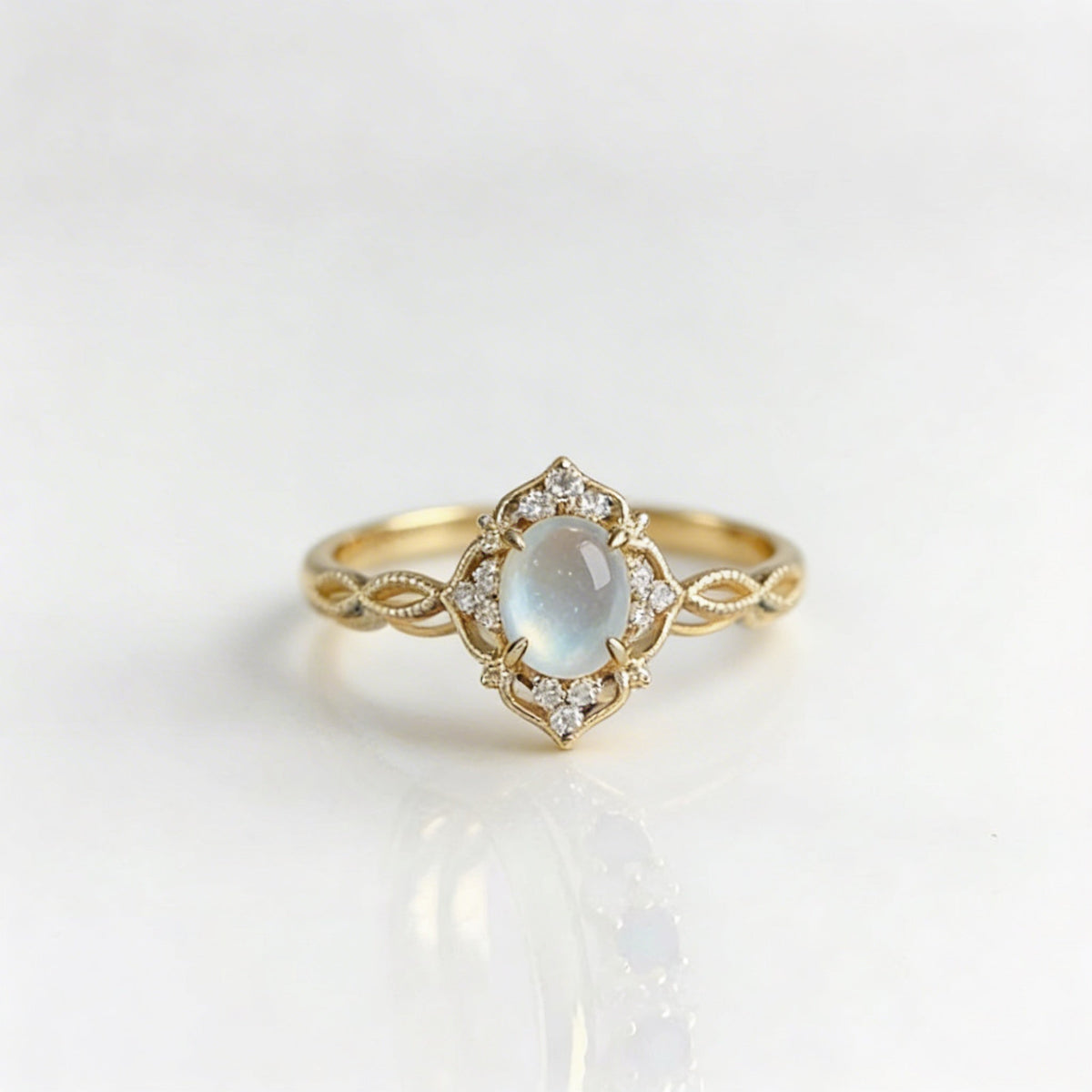 Hollow Flower Moonstone Ring with Cat's Eye Stone