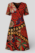 Jurk met patchworkprint, korte mouwen en zijzakken