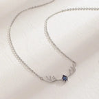 Hertengeweiketting met hartbedel