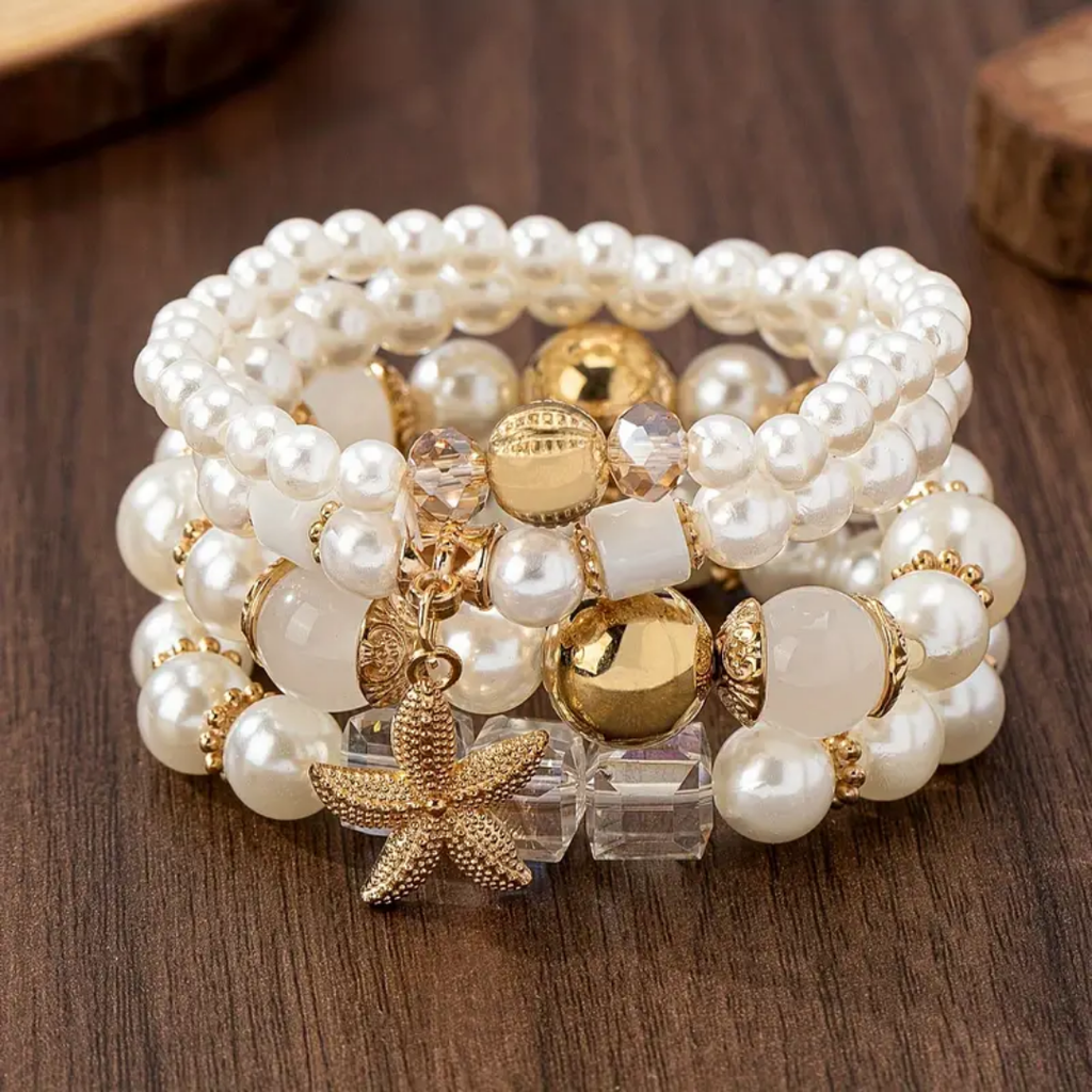 Armbandset met parel en zeester en goudkleurige accenten