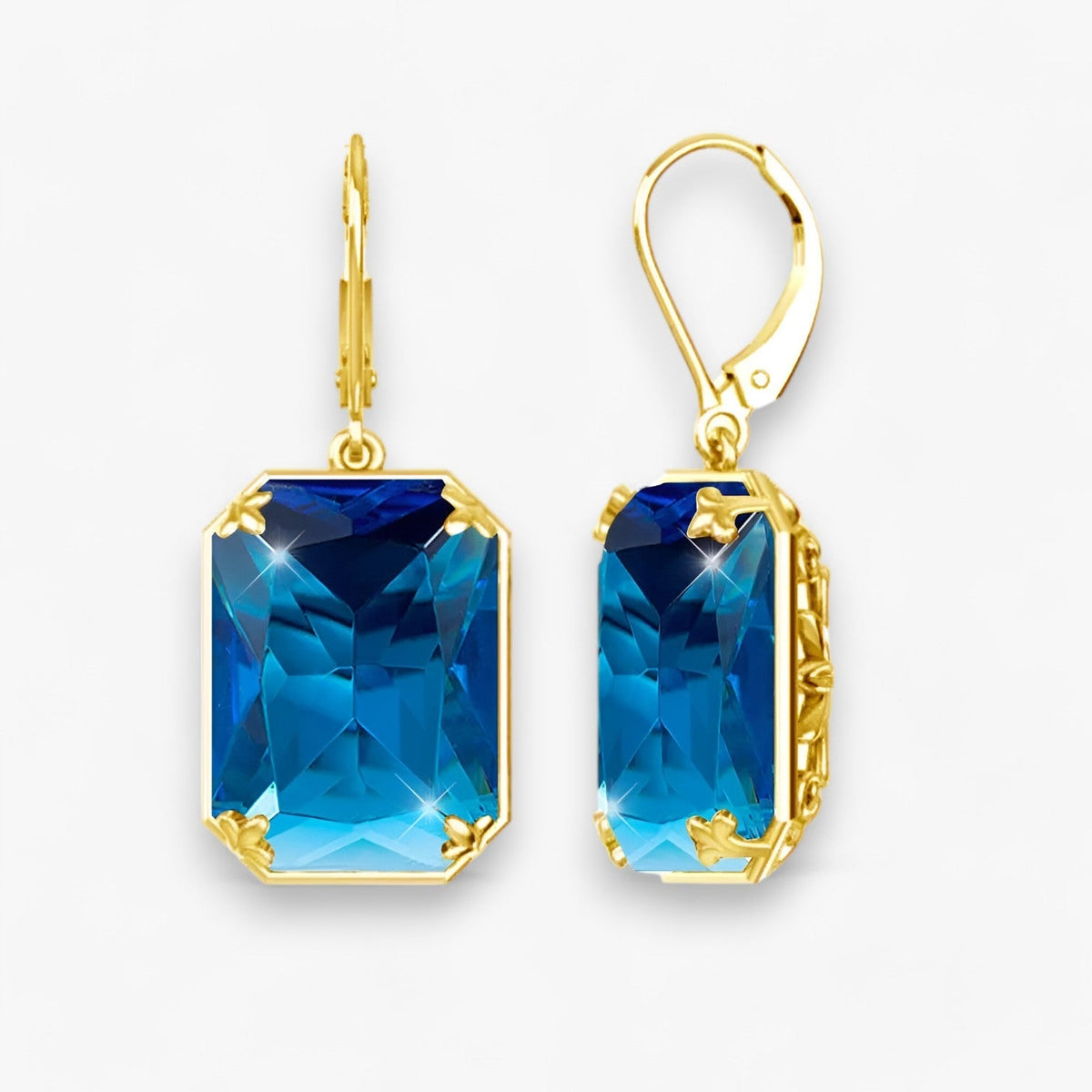 Oorhangers met blauwe steen in goud- en zilverkleur