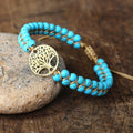 Handgemaakte levensboomarmband met turquoise stenen