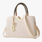 Elegant Zip-Top Handbag with Pearl Zip Detail