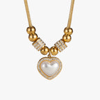 Ketting met harthanger, zirkoonstenen en parels