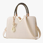 Elegant Zip-Top Handbag with Pearl Zip Detail