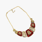 Goudkleurige statement choker met blauw detail
