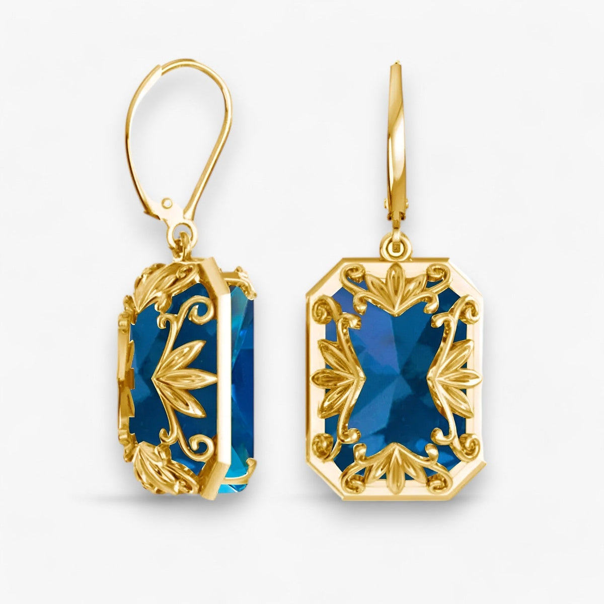 Oorhangers met blauwe steen in goud- en zilverkleur