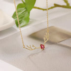 Hertengeweiketting met hartbedel