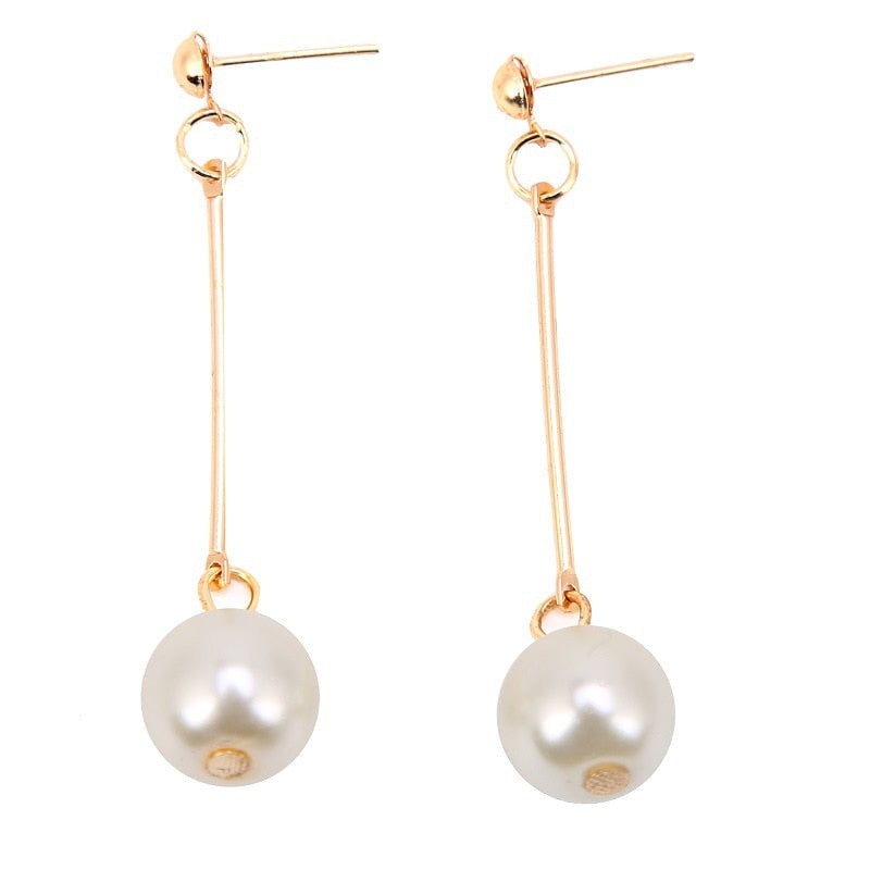 Oorhangers met parelstaafje aan lange ketting
