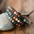Leren wikkelarmband met halfedelsteen en love