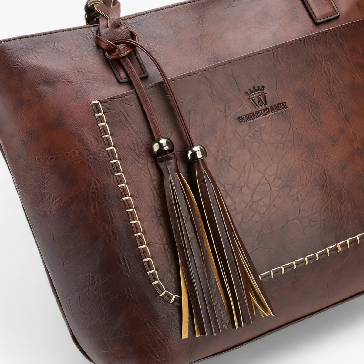 Simple Elegant Leather Handbag with Tassel Detail