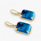 Oorhangers met blauwe steen in goud- en zilverkleur